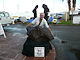 Barry placing a 2.2 Metric Ton Campo del Cielo individual on display in front of Inn Suites in Tucson