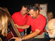 David Hardy and Dave Gheesling checking out a framed meteorite specimen